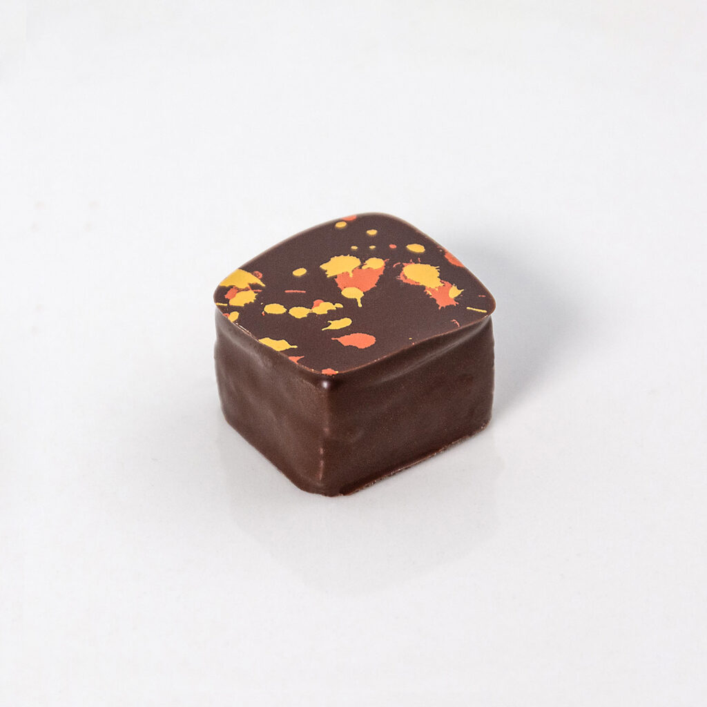 Bombón relleno de mango pepitoria