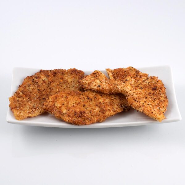 Rodajas de piña deshidratada cubiertas con Tajín